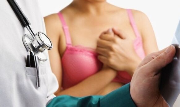 doctor's examination before breast augmentation